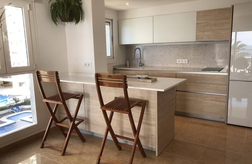 Calpe City Center Apartment | Beachfront Apartment with Sea Views, Pool, Garden & Wi-Fi