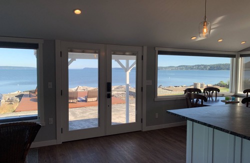 Camano Island House | Beachfront home with kayaks, SUP, firepit, great deck, AC and more!