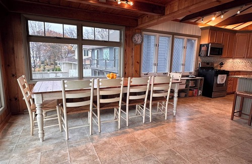 Pigeon House | Beachfront lake house with large deck, beach bonfire & stunning views!