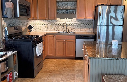 Pigeon House | Beachfront lake house with large deck, beach bonfire & stunning views!