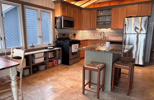 Pigeon House | Beachfront lake house with large deck, beach bonfire & stunning views!