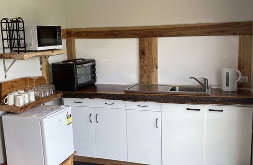 Bay of Plenty Region Apartment | Beachfront Pacific - Rustic Coastal - Guest Suite.