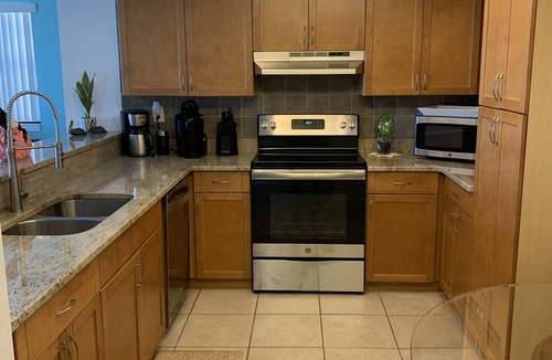 Redington Beach Condo | Beachfront - Steps to the Ocean & Private Pool.