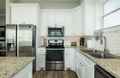 Spanish Grant House | BEACHFRONT! TEN STEPS TO BEACH SAND! PERFECT BEACH VACATION!