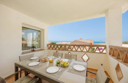 Urbanizacion Costabella House | Beachfront with Private Terrace, Garden, BBQ, and Garage in Marbella