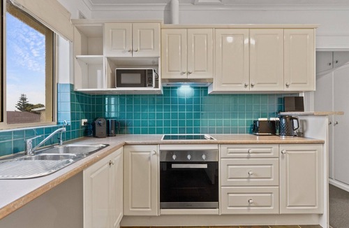 Glenelg North Apartment | Beachside 2-Bed Apartment with Balcony Views