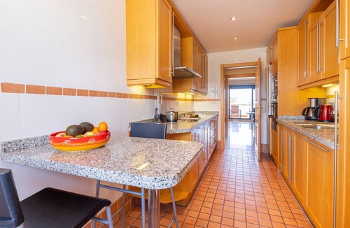 Gualdalmansa Apartment | Beachside Apartment with Pools & Terrace Views