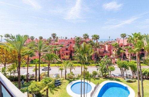 Gualdalmansa Apartment | Beachside Apartment with Pools & Terrace Views