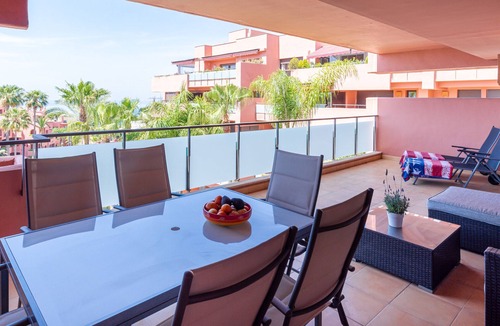 Gualdalmansa Apartment | Beachside Apartment with Pools & Terrace Views
