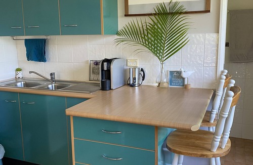 Forresters Beach Apartment | Beachside cabin + solar heated pool @ Spoon Bay