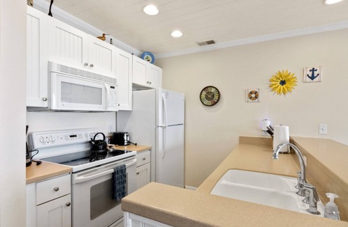 Traverse City Condo | Beachside Haven 102 |Beachfront Condo |Near Downtown + Tart Trail