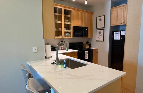Folly Beach Condo | Beachwalk Villa 11 - Walk to Beach & Downtown Area! Partial Ocean Views