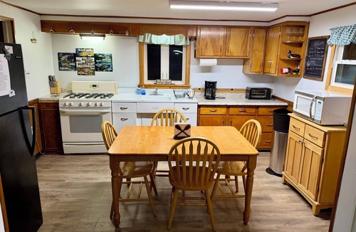 Slate Run House | Bear Run Lodge-Creek front, steps away from everything! Newly updated flooring.