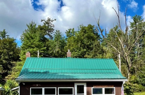 Slate Run House | Bear Run Lodge-Creek front, steps away from everything! Newly updated flooring.