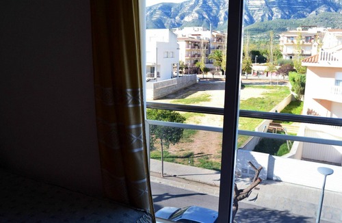 Sant Carles de la Rapita Apartment | Beautiful apartment for 6 guests with pool, TV and balcony