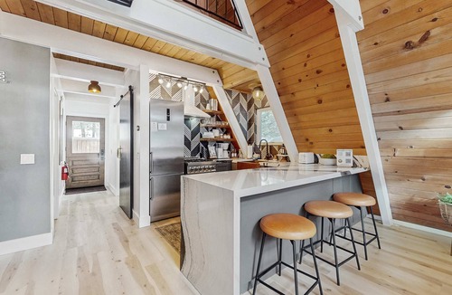 Tahoe Paradise Cabin | Beautiful A-frame home with deck, streaming, and dog friendly - near skiing