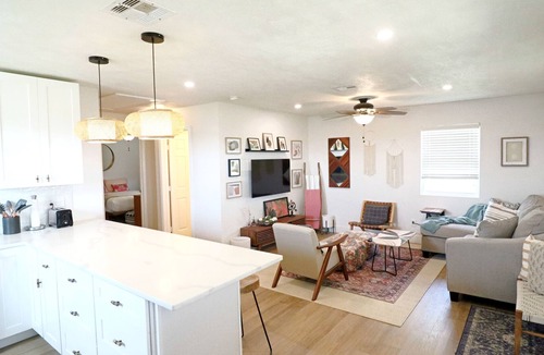 Surfside Beach Cottage | Beautiful and cozy home with large deck and expansive views.