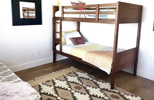 Surfside Beach Cottage | Beautiful and cozy home with large deck and expansive views.