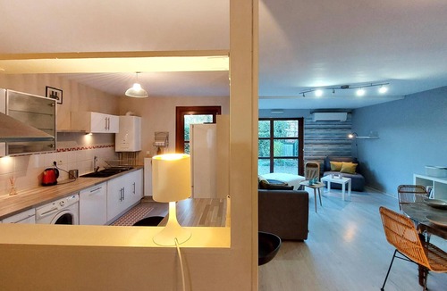 La Grand-Croix Apartment | Beautiful and modern apartment with a large window front.