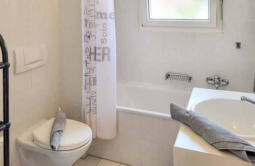 Caslano Apartment | Beautiful apartment for 4 guests with pool, WIFI, TV, balcony, panoramic view and parking
