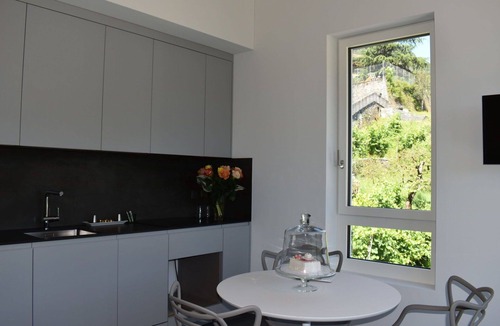 Golino Apartment | Beautiful apartment for 4 guests with pool, WIFI, TV, patio, pets allowed and panoramic view