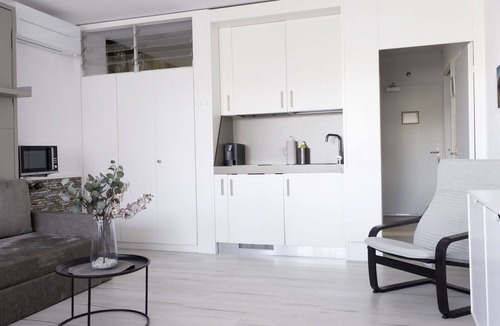 Bissone Apartment | Beautiful apartment for 4 people with A/C, WIFI, pool, TV, balcony and panoramic view
