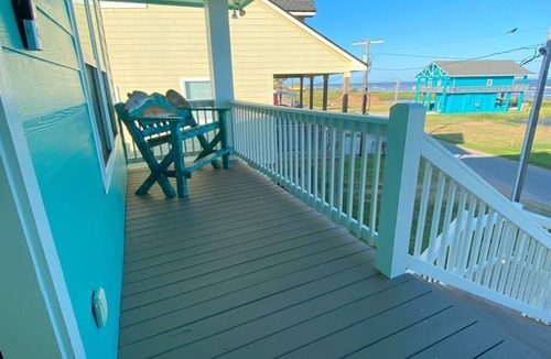 Cedar Lane House | Beautiful beach house boasts a scenic water view from its front and back doors.