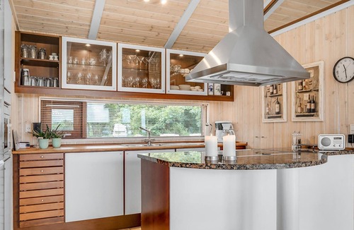 Handrup Strand House | Beautiful, bright cottage with large wooden terrace and sea view.