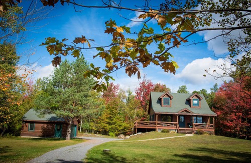 North Pole Cabin | BEAUTIFUL CABIN NEAR WHITEFACE WITH FIRE PIT AND WRAP AROUND PORCH