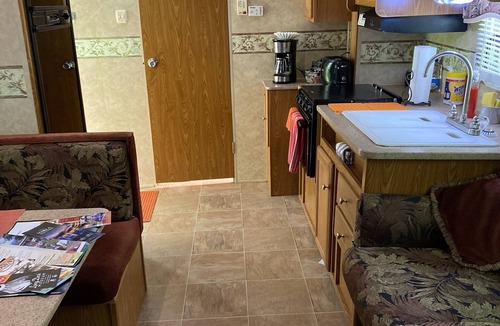 Dewittville House | Beautiful Camper on a country road.