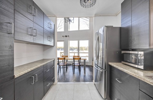 Laird Cottage | Beautiful cottage on the lake with brand new sauna, large yard and office space.