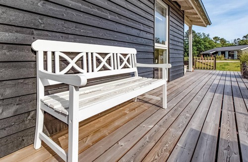 Nykøbing House | Beautiful cottage with kitchen open connection with dining and living room with an alcove.
