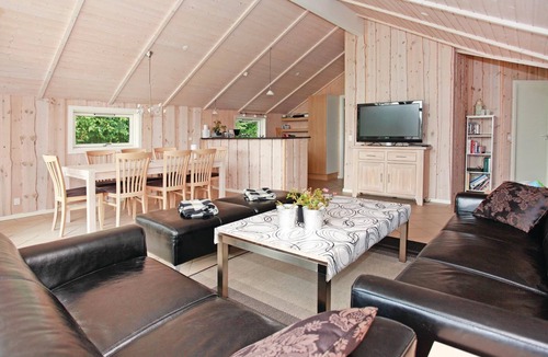 Atterup House | Beautiful cottage with kitchen and living area in one room.
