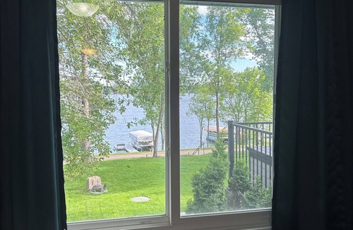 Maple Lake House | Beautiful deck overlooking Maple Lake with private, shared dock.