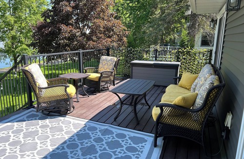 Maple Lake House | Beautiful deck overlooking Maple Lake with private, shared dock.