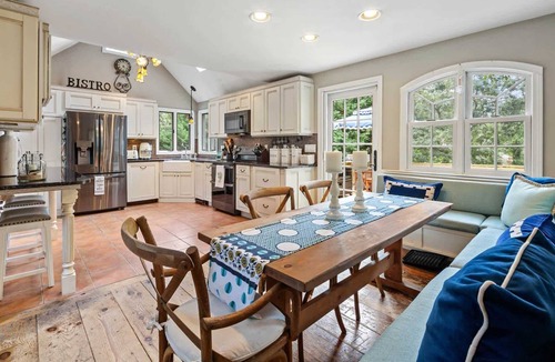 Eastham House | Beautiful Eastham home featuring lush gardens with heated in ground pool