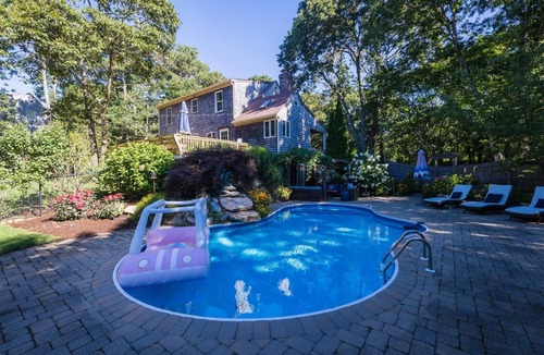 Eastham House | Beautiful Eastham home featuring lush gardens with heated in ground pool