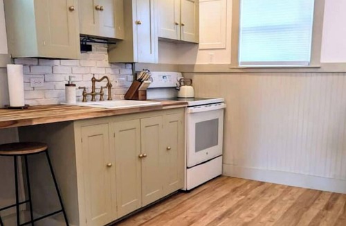 Orange House | Beautiful Fall Foliage Waterfront Fire Pit