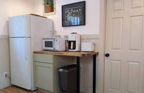 Orange House | Beautiful Fall Foliage Waterfront Fire Pit