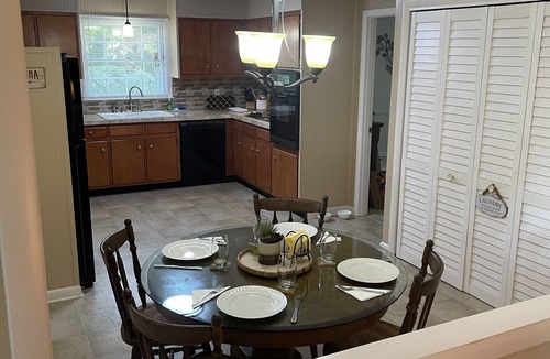 Covington House | Beautiful Home in Safe, Private Setting Only Blocks From the Square