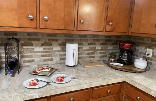 Covington House | Beautiful Home in Safe, Private Setting Only Blocks From the Square