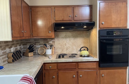 Covington House | Beautiful Home in Safe, Private Setting Only Blocks From the Square