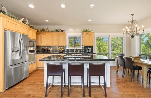 RiverWild House | BEAUTIFUL HOME OVERLOOKING THE RIVER-MINUTES TO IT ALL-UPDATED KITCHEN!