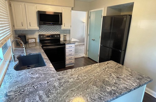 Millard House | Beautiful Home with peaceful backyard!