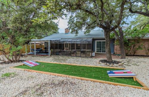 Hidden Forest House | Beautiful Home with Sunroom, Gameroom, Yard & BBQ