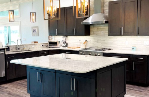 Crooked Lake House | Beautiful home with white sand beach on stunning Crooked Lake
