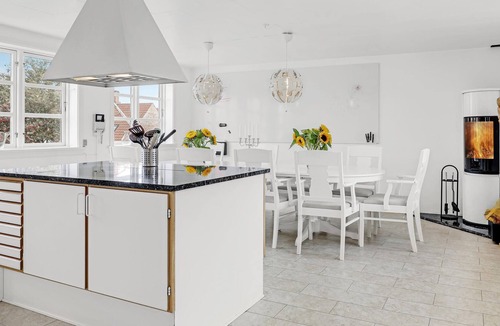 Ronne House | Beautiful, inviting two-story vacation rental with a cozy terrace that provides ocean views, comfort