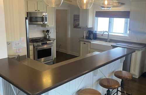 Lauderdale Lakes House | Beautiful lakefront view on Lauderdale Lakes only steps away from golf course.