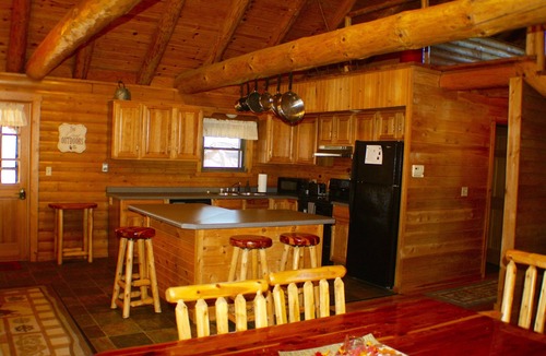 Attica House | Beautiful Lofted Home with Rugged Wood Interior Featuring Large Beams