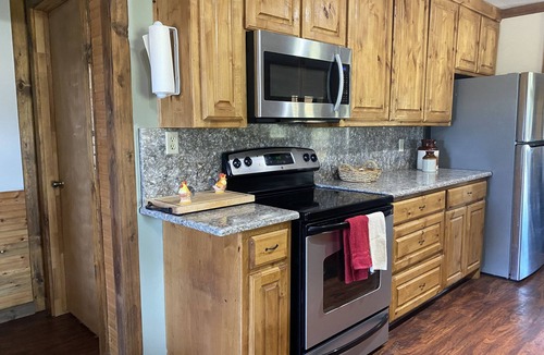 Gordonville Cabin | Beautiful log cabin with huge wrap around porches!